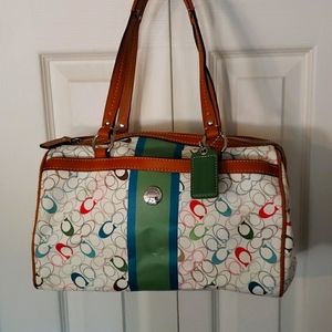 Coach purse. With cosmetic case.